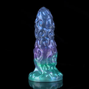 Bad Dragon Aries Gradient Blue Green Purple Fantasy Dildo with a swirling design and translucent finish